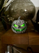 Poisoned Pumpkin Skull with LED Candle – Spooky Decorative Piece